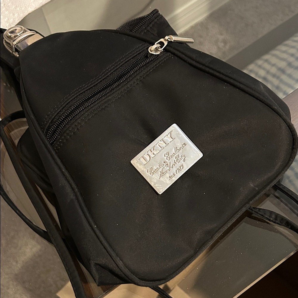 DKNY Black Backpack with gold Accents